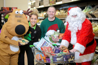 Colleen from Asda Omagh hands over supplies