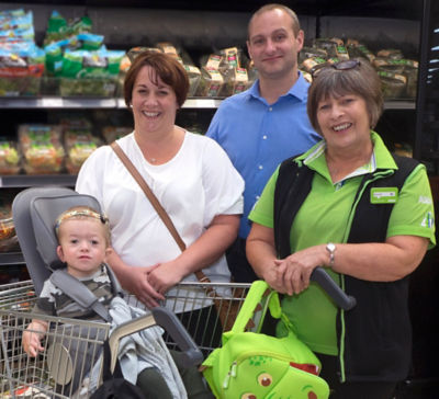 Leo and his family at the store