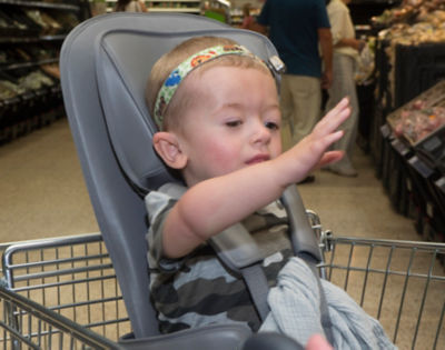 Leo waves from his trolley