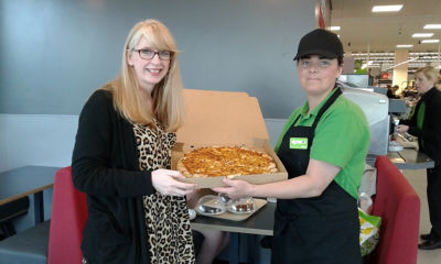 Our colleague Marie Doyle serving up some of our tasty hot pizza.