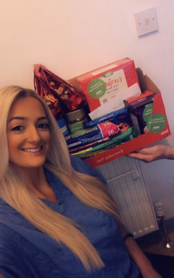 Kirby Davison staff nurse taking the donation.  | Asda Hessle