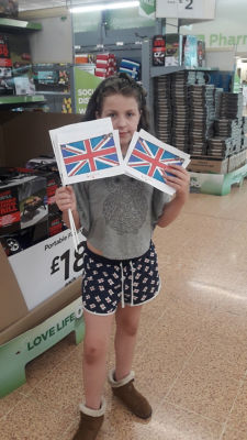 Leelo and her homemade flags  | Asda Longwell Green
