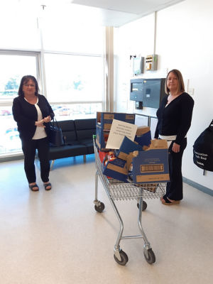 Barton Brook Nursing Home picking up a donation of biscuits for their VE Day celebrations | Asda Trafford Park
