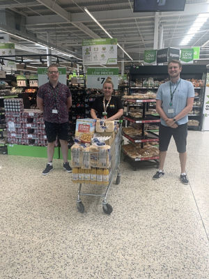 Stephen Longfellow Academy donation | Asda Middleton