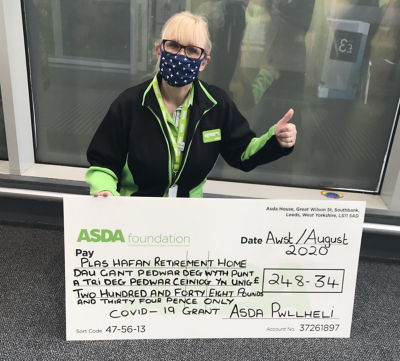 Presentation of £248 Asda Foundation cheque to Plas Hafan retirement home | Asda Pwllheli