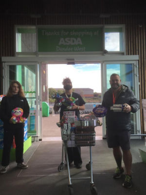 Building a stronger menzieshill community project receiving a donation of raffle prices. | Asda Dundee West