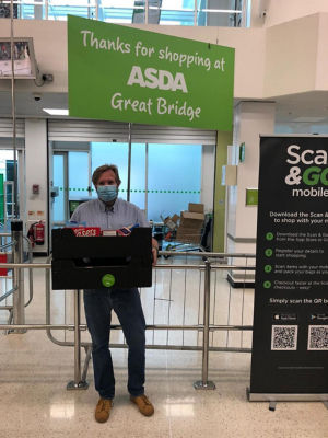 Rafffle prize donation for Ryders Green Day Centre | Asda Great Bridge