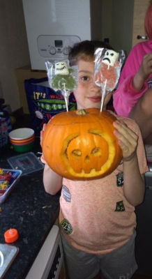 Befriend a child pumpkin carving. | Asda Aberdeen Beach