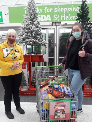 Donation to St Helen's Carers | Asda St Helens