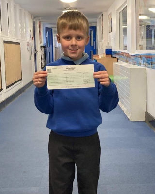 The Grange First School is over the moon with Asda's £800 cheque | Asda Gosforth
