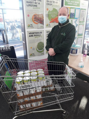 Tins of fruit for local food bank | Asda Leigh