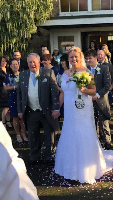Wedding day picture of Sharon and Del Wing who met at Asda Stonecot Hill