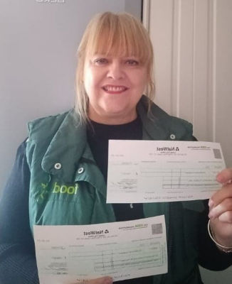 Fantastic grant cheques | Asda St Leonards