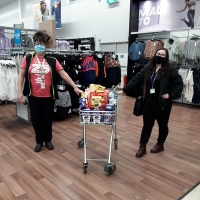 Hillcrest futures young people's services receiving a donation of Easter eggs.  | Asda Dundee West