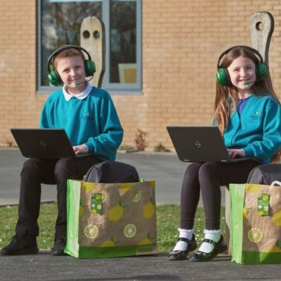 Laptops donated to Tor Bridge Primary School | Asda Plymouth