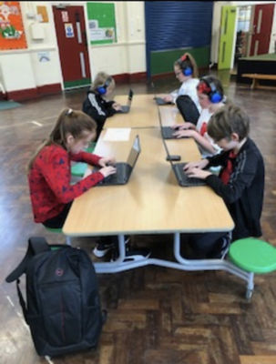 Laptop donations to Cheddar Grove School | Asda Bedminster