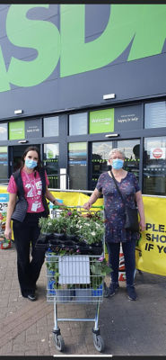 Bolton West Guerilla gardeners donation | Asda Burnden Park