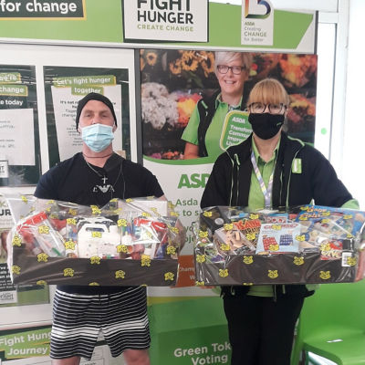 New group to our community called Qclub supporting youths in the area receiving a donation of board games and crat products  | Asda Colne