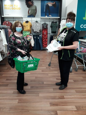 Charleston community gardening project receiving seeds fruit and information sheets for their new local project. | Asda Dundee West