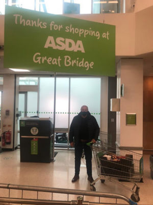 Gary from The Kaleidoscope plus Group collecting donations for their monthly raffles.   | Asda Great Bridge