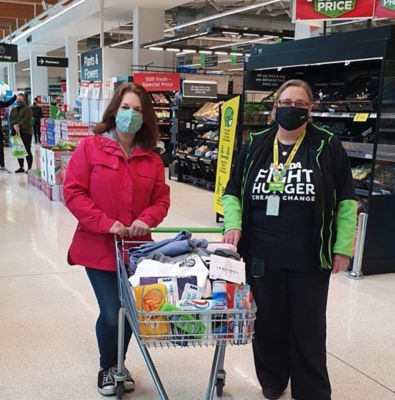 Donation to Wintercomfort for the homeless | Asda Cambridge