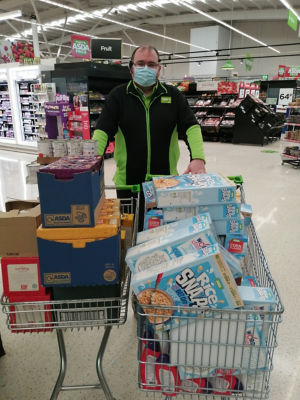 Donation to Newday Church foodbank | Asda Clayton Green