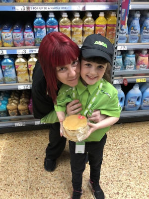 Amelia dresses as Asda colleague like mum Kim Weaver from Asda Waterlooville