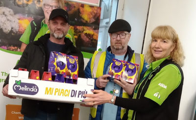 Donation of Easter eggs to curry on the street  | Asda Colne