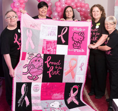Helen-Louise Sestan-Burton from Asda Bromborough with her Tickled Pink quilt