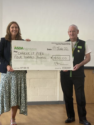 Chaucer Community Primary School PTFA receiving the DGTG cheque for £400 | Asda Fleetwood