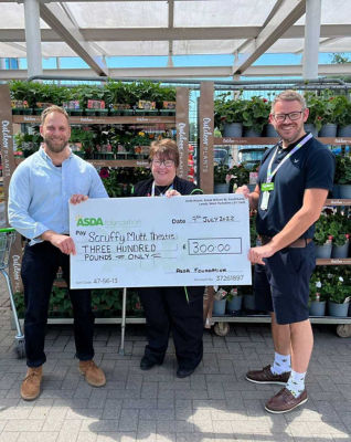 Q1 cheque presentation  | Asda Falmouth