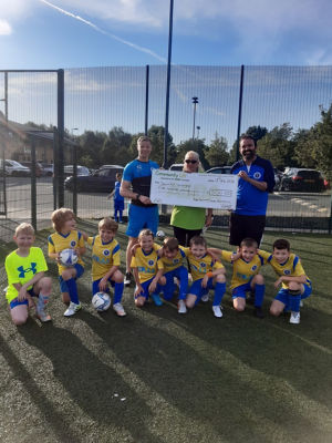 Swinton Wolves receive £500 | Asda Swinton