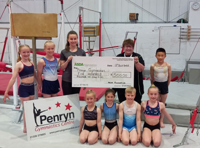 Cheque presentation for Penryn Gymnastics group | Asda Falmouth