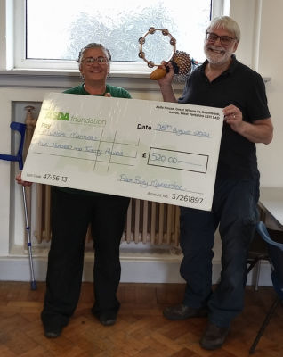 £520 grant for Musical Memories | Asda Bury Marketside