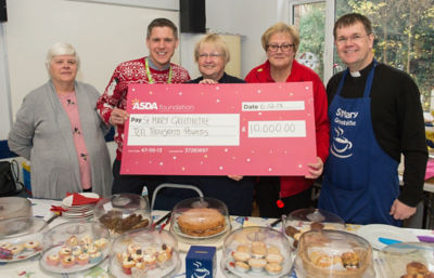 Bridget and Chris from Asda Greenhithe present the cheque