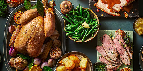 Whole chicken with a variety of vegetables and lamb rump joint