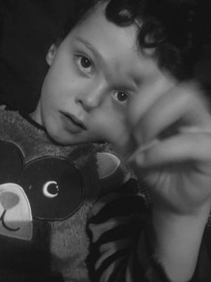 Alfie in his Asda raccoon pyjamas