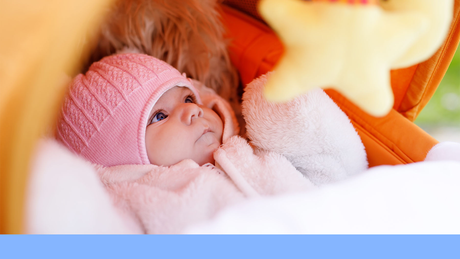 Baby in hat and coat