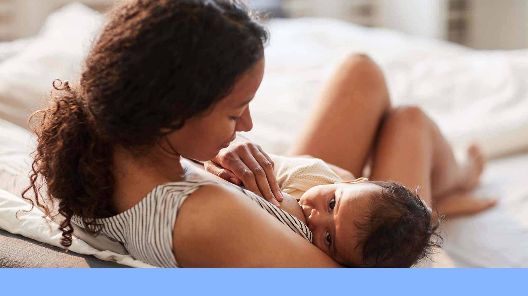 Mother breastfeeding baby