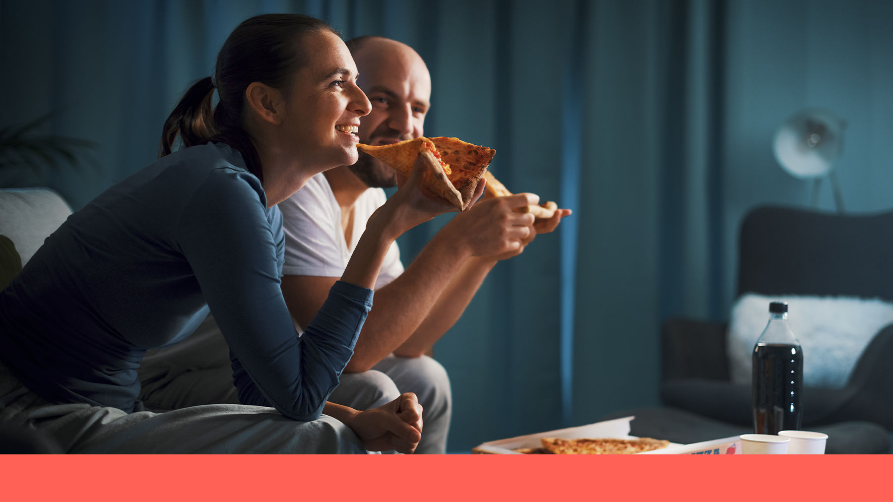Couple eating pizza