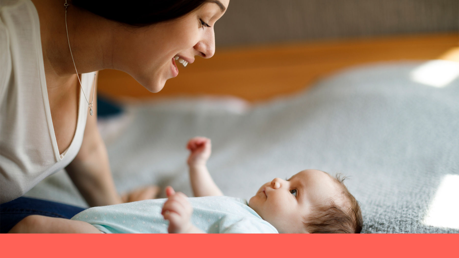 Mother talking to her baby