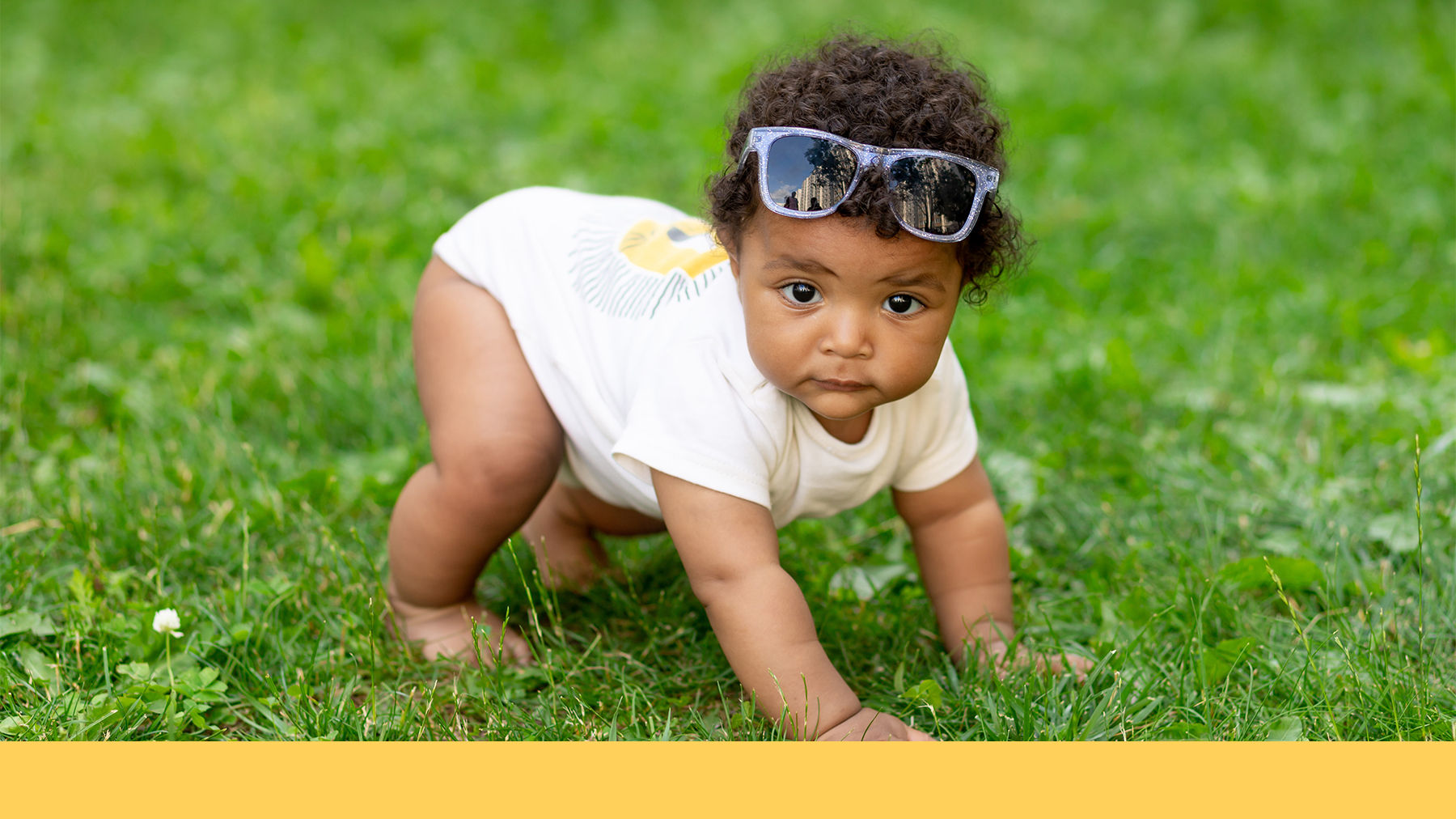 Baby playing in the garden