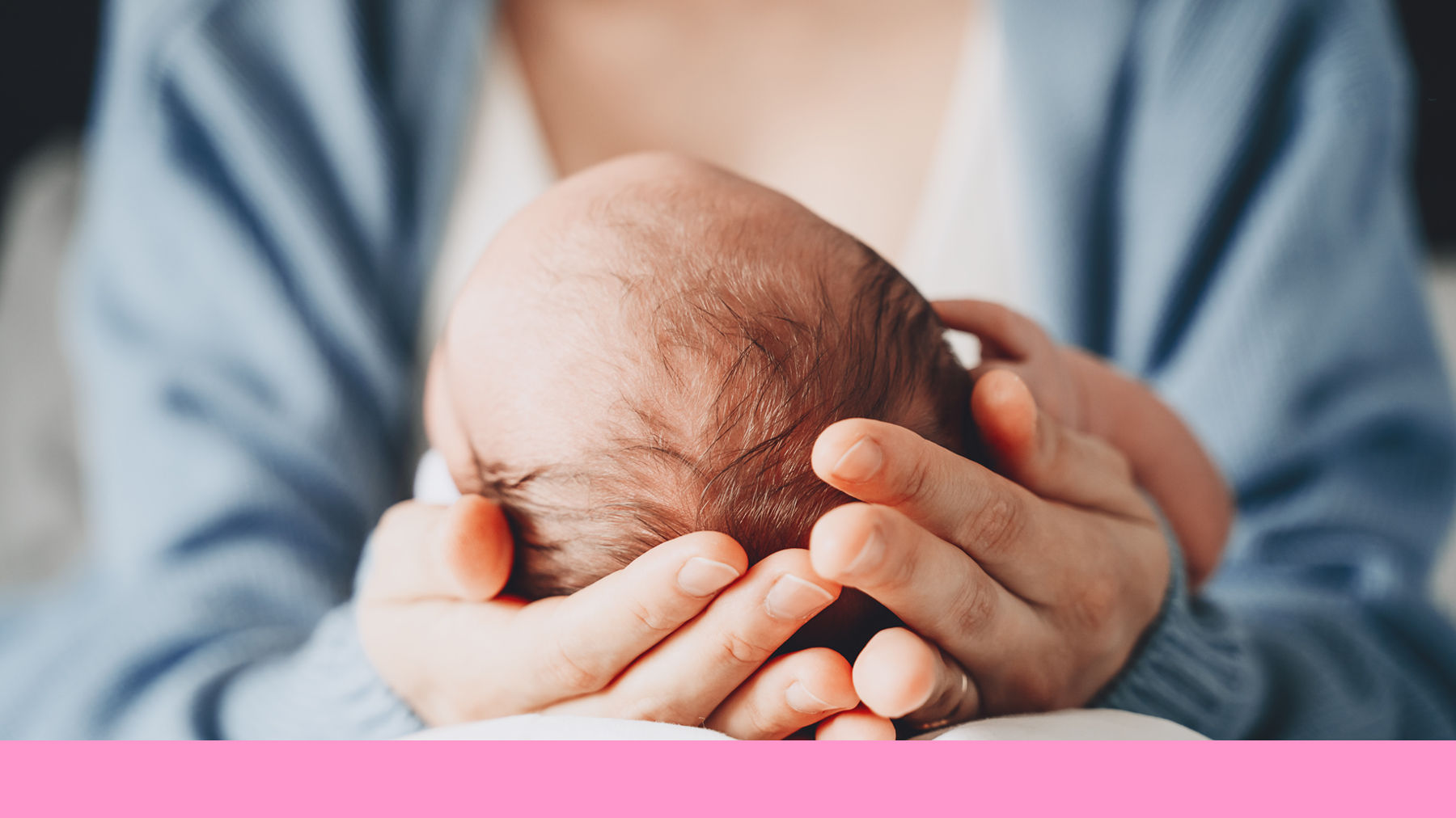 Baby being held