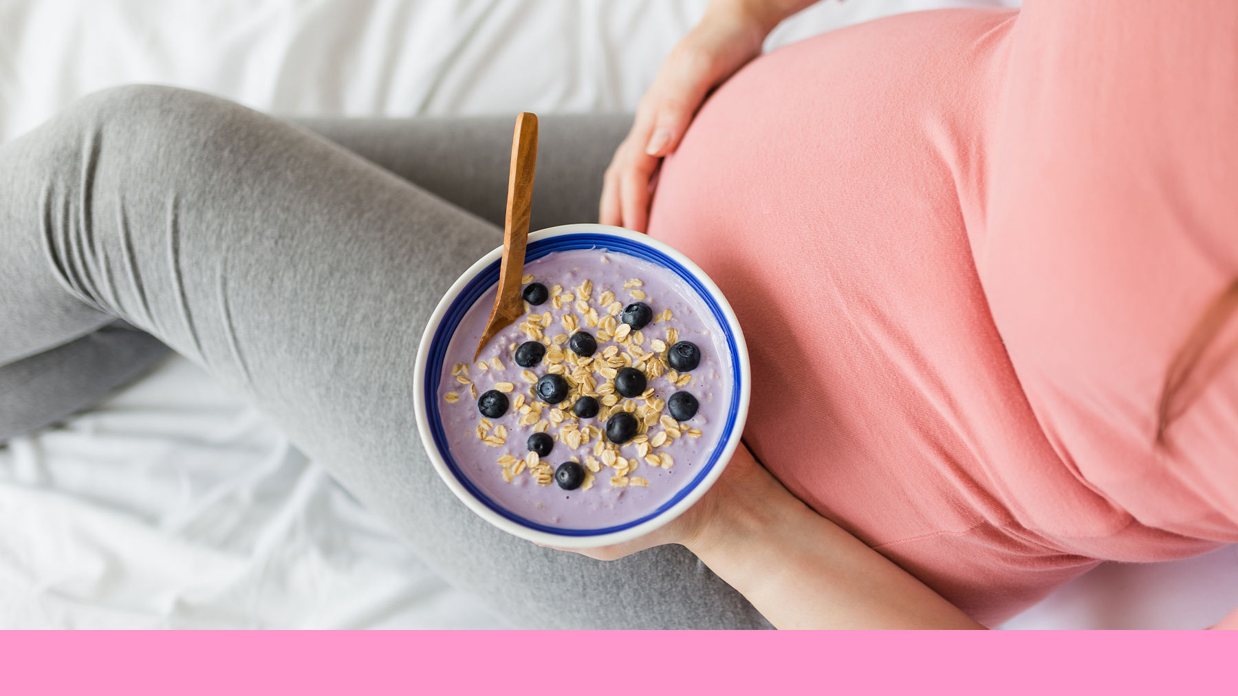 Pregnant woman eating breakfast
