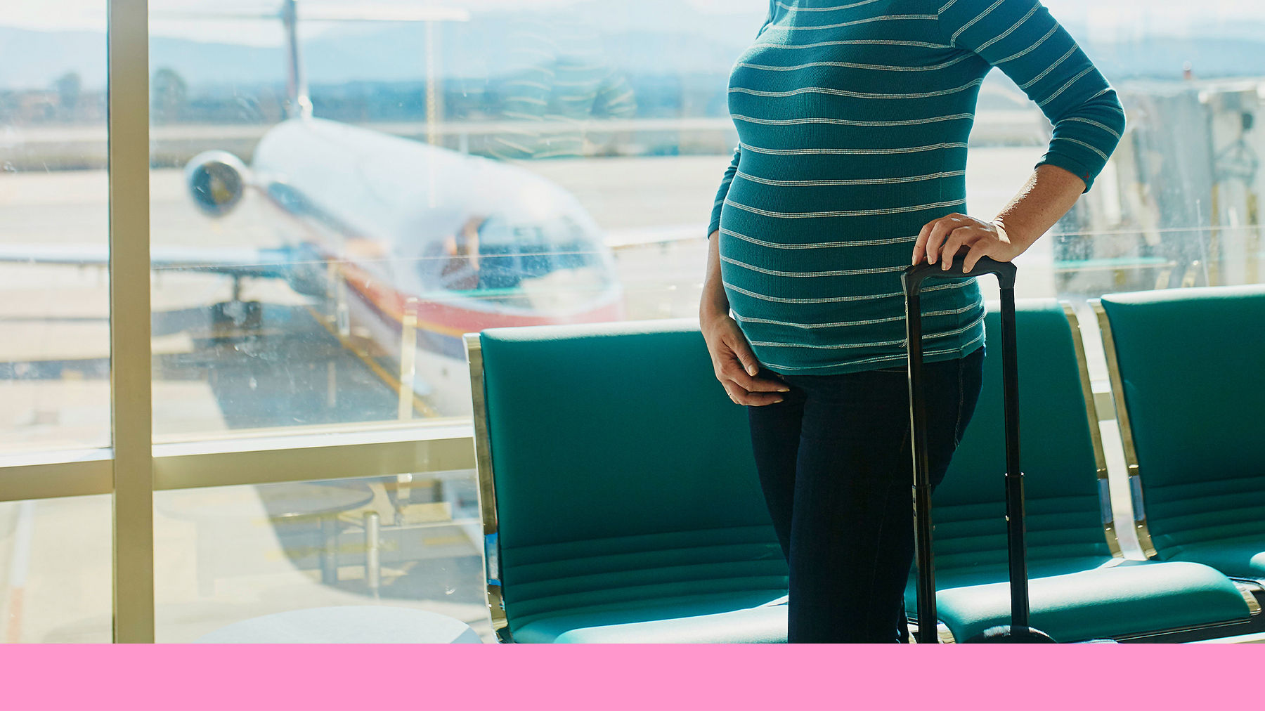 Pregnant woman at the airport