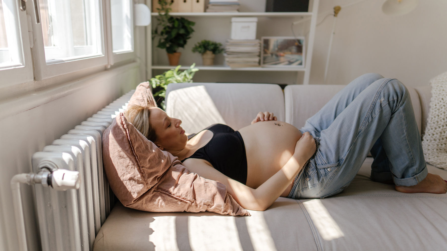 Pregnant woman lying on a chair
