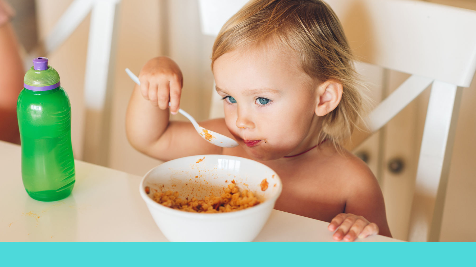 Toddler eating vegetables