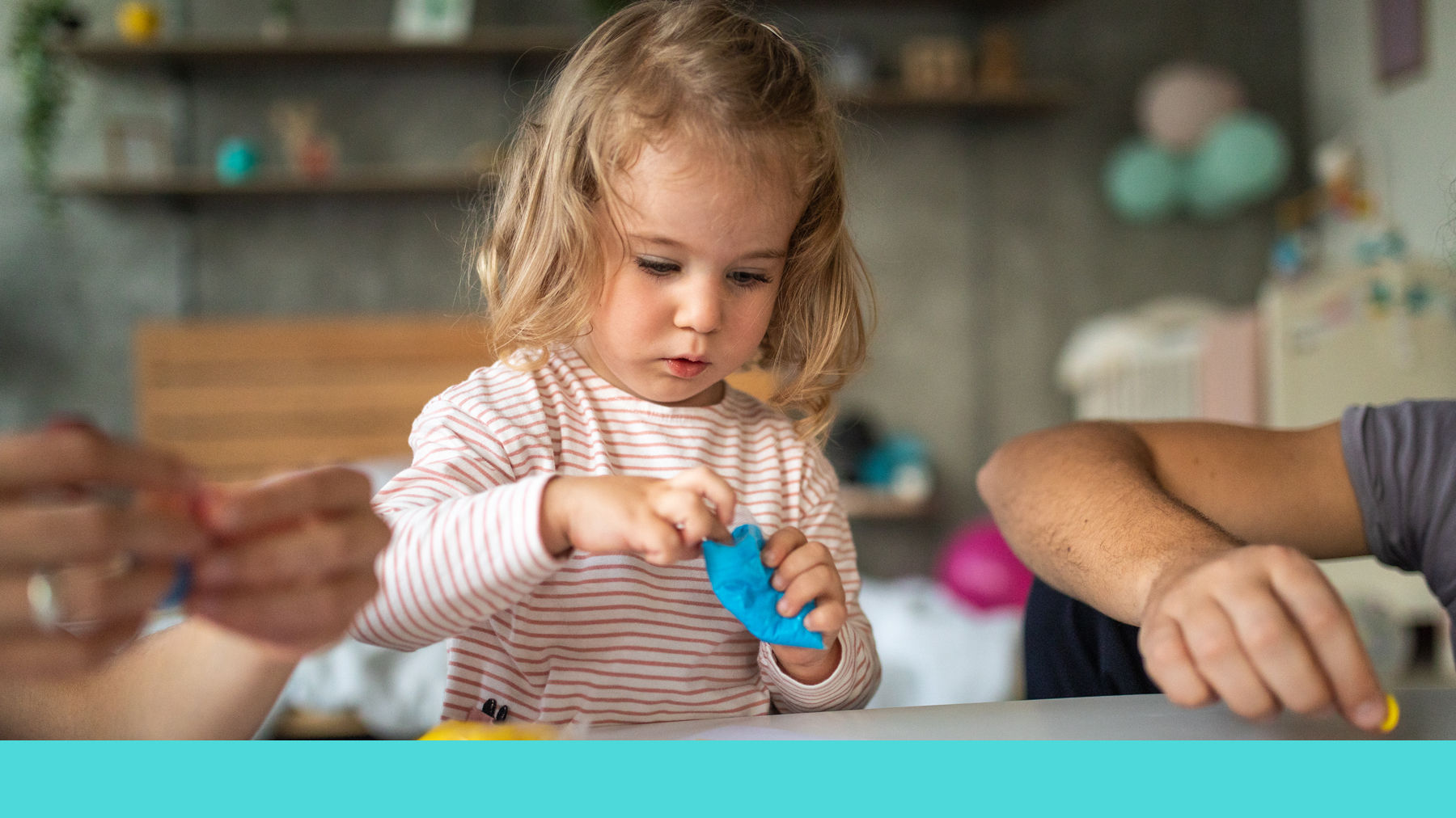 Toddler playing with toys