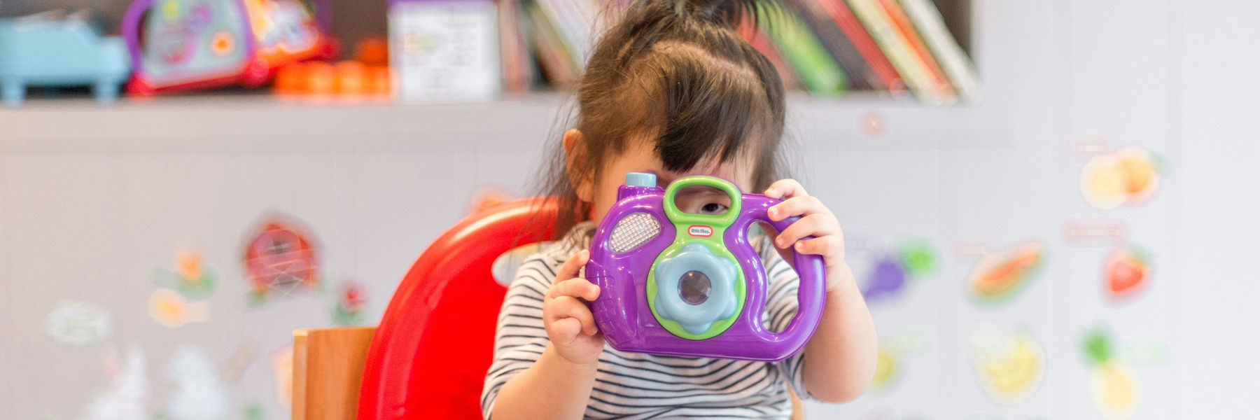 Toddler playing at nursery