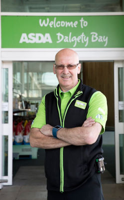 Andy  outside the Dalgety Bay store
